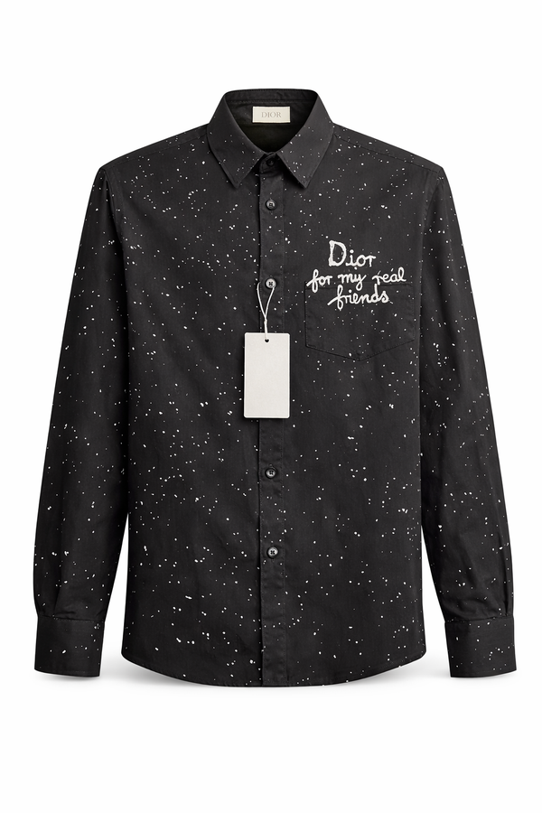 Dior featuring a speckled pattern and a white embroidered phrase on the pocket.